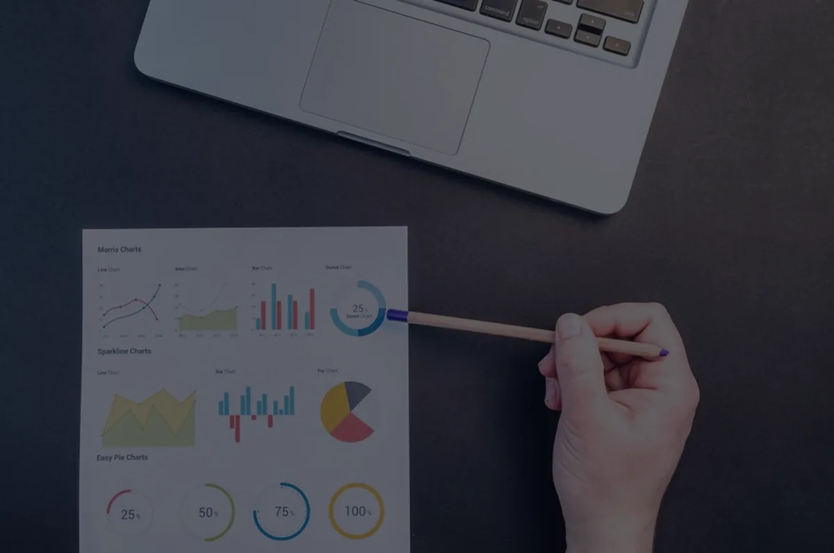A dark financial dashboard with charts, representing the 50/30/20 budgeting rule.