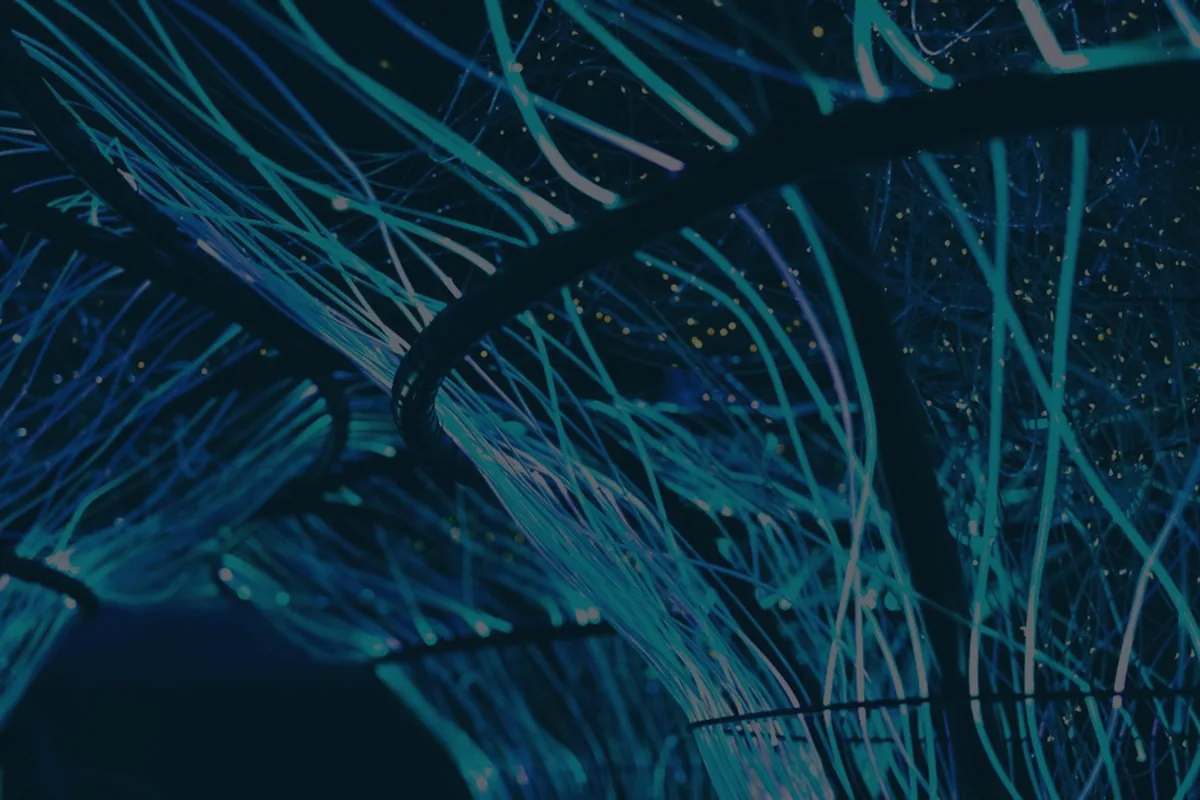 Streaks of blue light on dark, representing a credit card balance transfer.