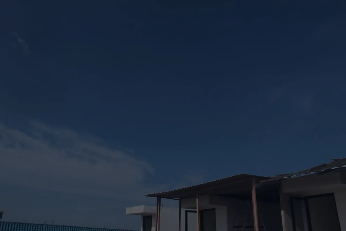 A modern house in dark tones, representing private mortgage insurance (PMI).
