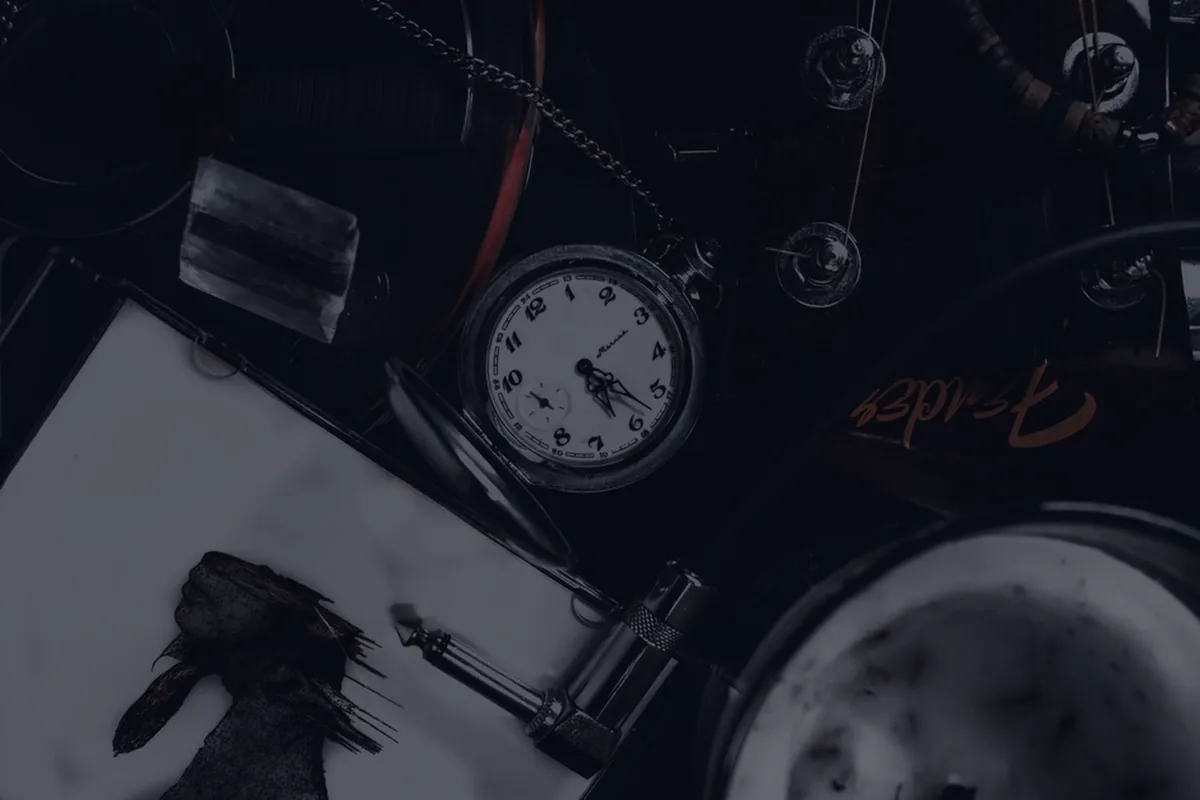 A dark clock and instruments, representing required minimum distribution rules and deadlines.