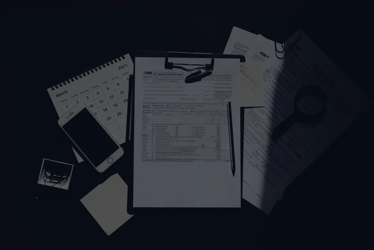 A dark close-up of a tax form, representing understanding your W-2.